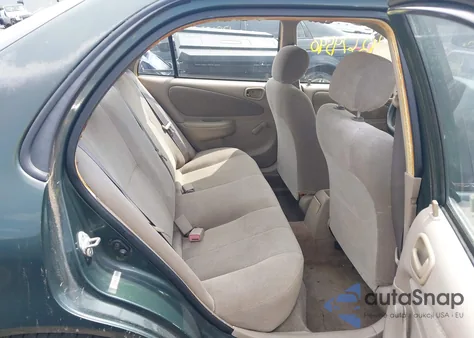 2001 Toyota Corolla Ce z USA, uszkodzony, nr VIN 2T1BR12E81C475853